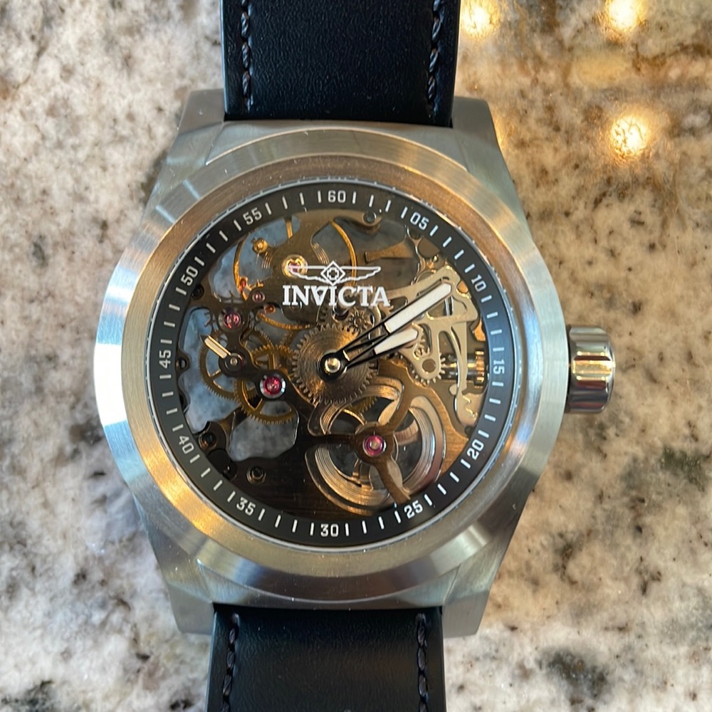 Invicta mechanical (windup) watch. Minor wear on strap